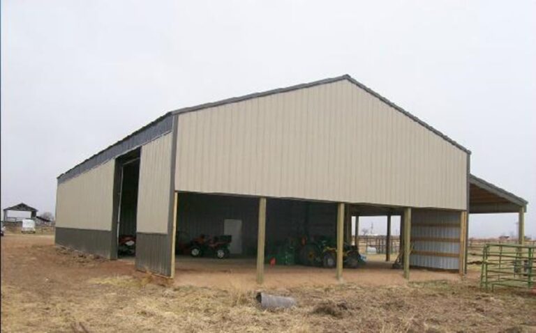 large gray and sandstone barn
